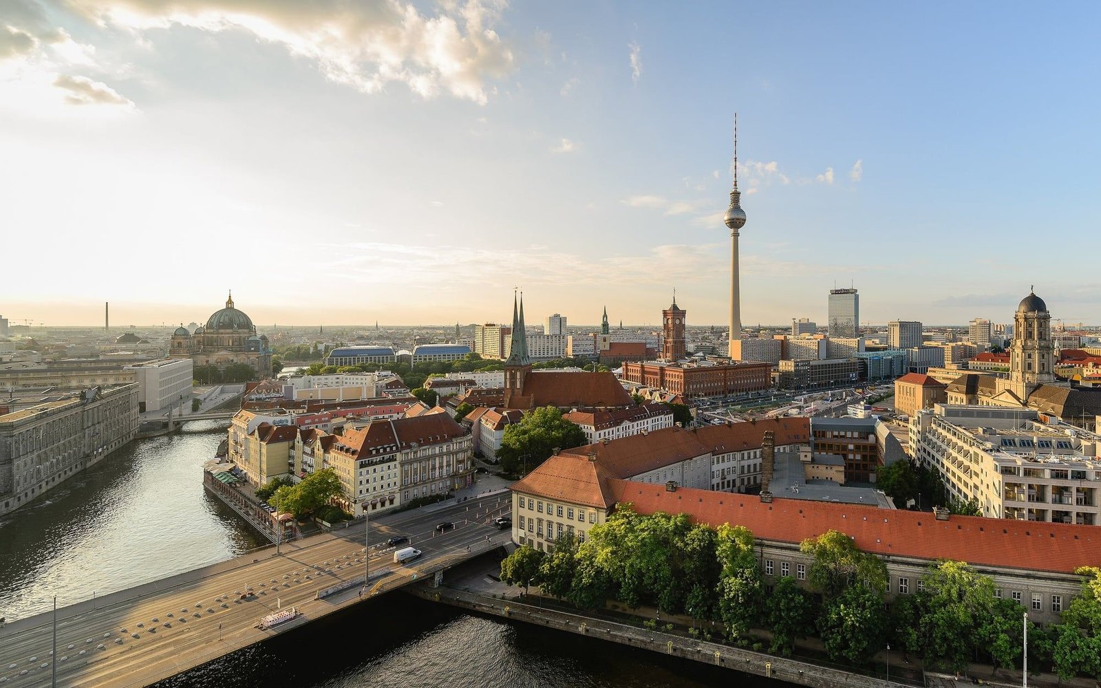 Central Berlin from above in golden evening light, with the Spree, Berlin Cathedral, the Red Town Hall and the TV tower